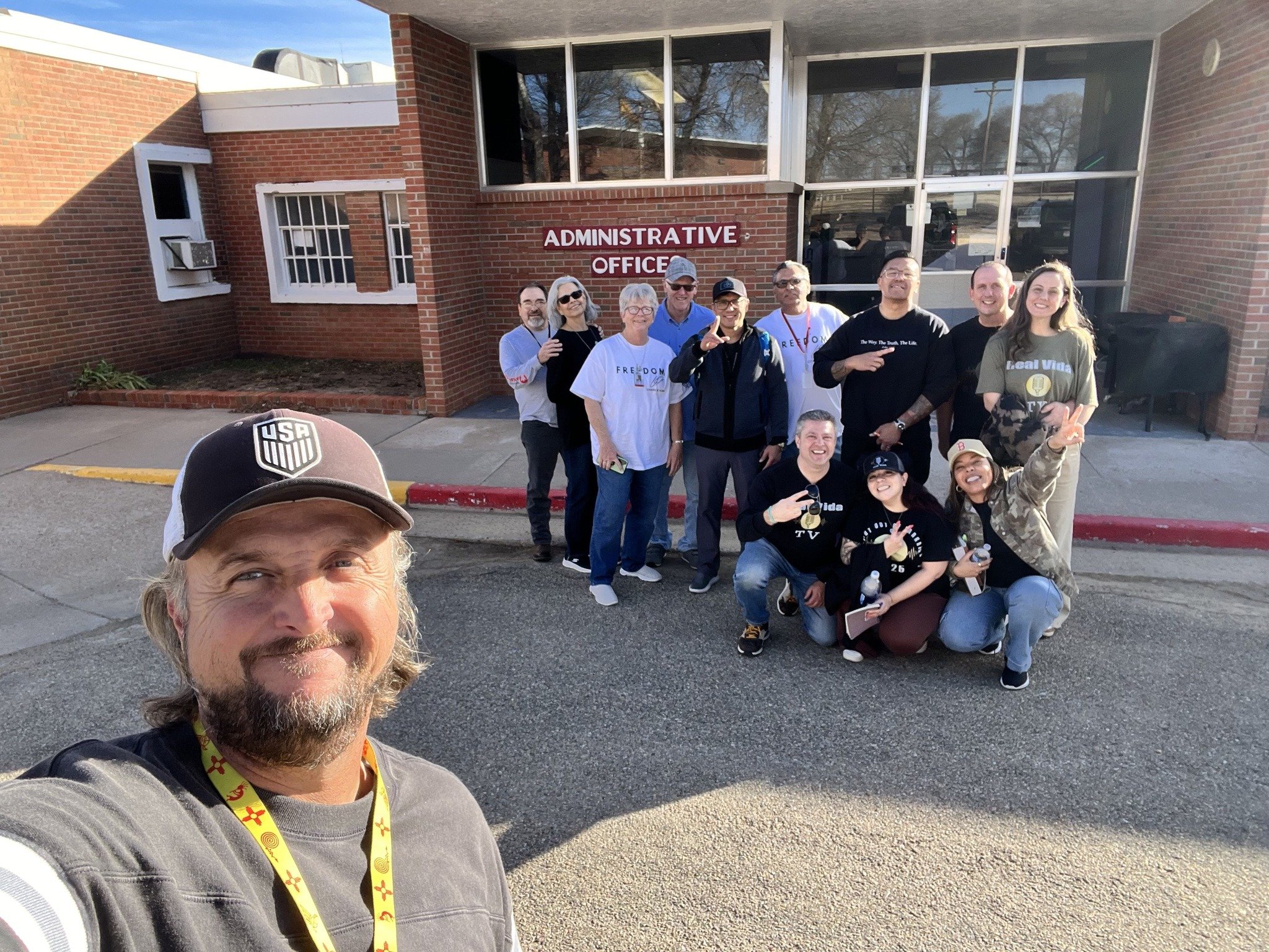 Team outside prison